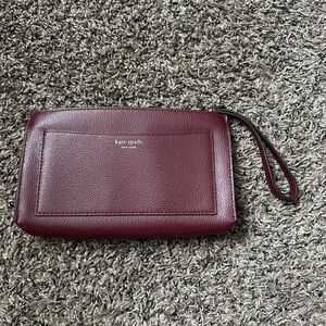 kate spade New York Eva Pebbled Burgundy Red Leather Clutch Wristlet.